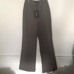 Pretty Little Thing new with tag pants . Size 8